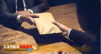 අල්ලස් හෝ දූෂණ චෝදනා විමර්ශන කොමිෂන් සභාවේ සභාපති ලෙස විනිසුරු ඩබ්. එම්. එන්. පී. ඉද්දවල