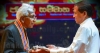 ලැජ්ජයි ; සිරිසේන අතින් ගත් දේශමාන්‍ය පදක්කම ආපහු සිරිසේනටම දෙයි.